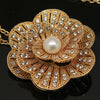 Freshwater pearl - Gold camellia shaped brooch