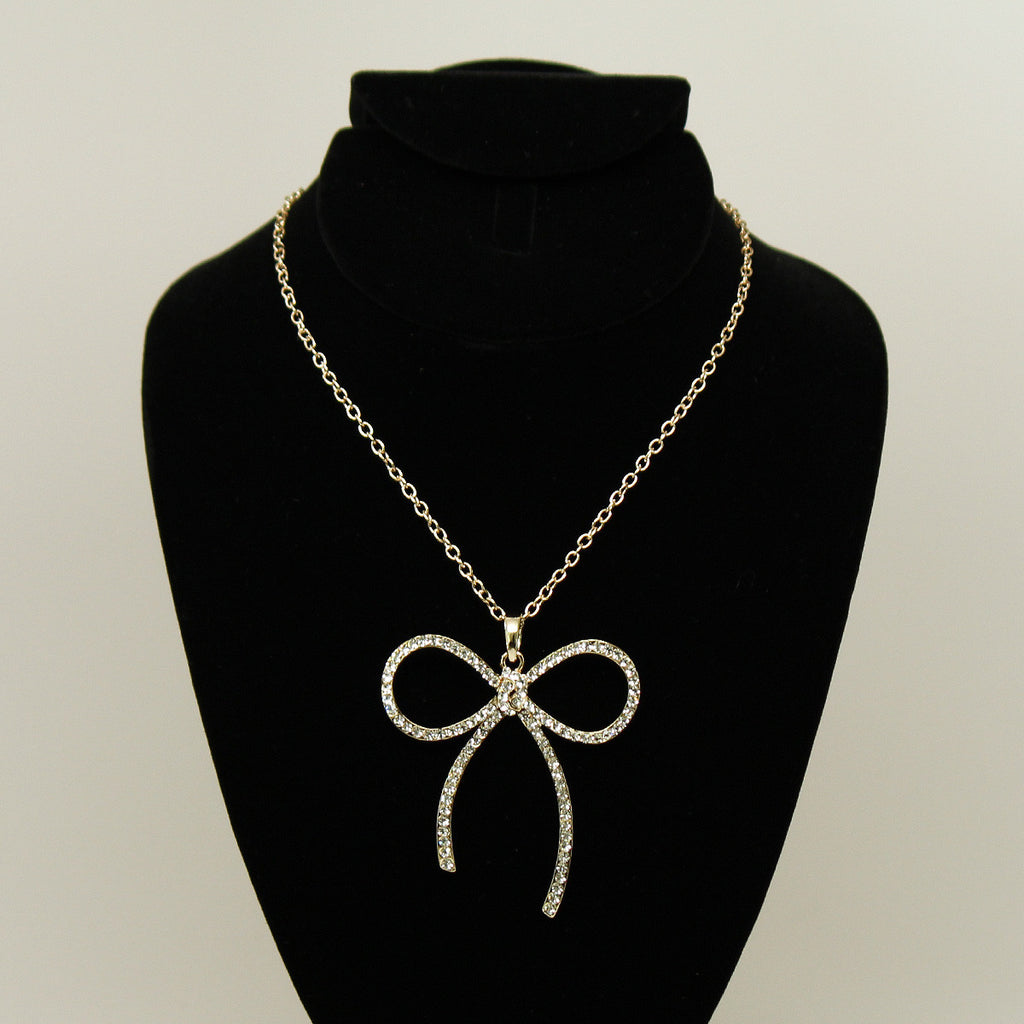 Synthetic diamond bow pendant necklace