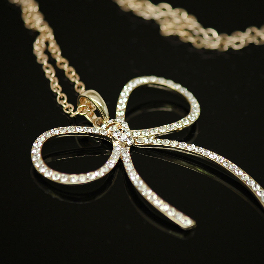Synthetic diamond bow pendant necklace