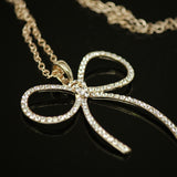 Synthetic diamond bow pendant necklace